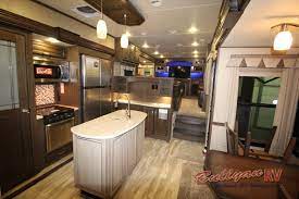 So, for a little solitude of your own, come select a new grand design solitude fifth wheel and toy hauler and find a vacation spot to call home for a we are proud to offer a wide variety of solitude 5th wheel floorplans that you will love, including the 300gk, the 300gk r, the 305re, the 310gk, and. Grand Design Solitude Reflection Or Imagine Fifth Wheels Or Travel Trailers Which Is Right For You Bullyan Rvs Blog