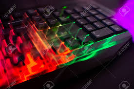 Gaming Keyboard With Led Lights Leak On Black Background Stock Photo Picture And Royalty Free Image Image 142285306