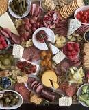 What do you put on a charcuterie cheese platter?