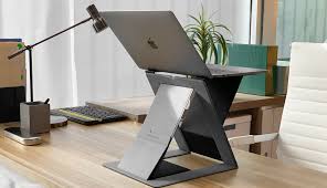 The electric ones usually have a button which you must press to lower or up the desk. Moft Z Invisible Sit Stand Laptop Desk The Coolector