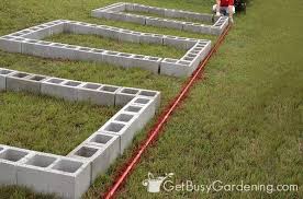 The major benefit of cement plaster is that it creates a beautiful appearance and provides consistency for blocks that may be out. How To Build A Raised Garden Bed With Concrete Blocks A Complete Guide Get Busy Gardening