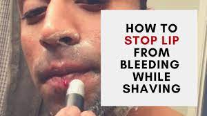 how to stop bleeding on lip from
