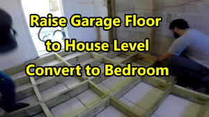 raise garage floor to house level