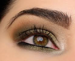 a smoky olive green eye with make up