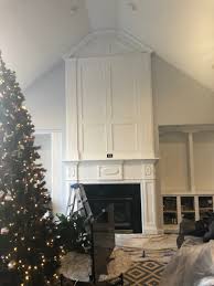vaulted ceiling and fireplace mantel