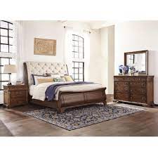 Replaced side rails and footboard and then discovered warpage with dresser. Trisha Yearwood Home Collection 4 Piece Queen Upholstered Bedroom Set In Coffee Nebraska Furniture Mart