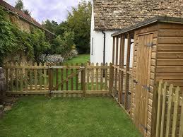 Picket Fence Creates Dog Fence For