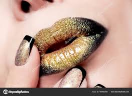 bright shiny golden lip makeup close