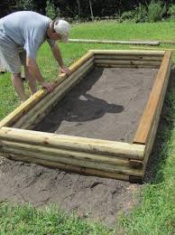 raised bed using landscape timbers
