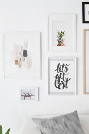 Living room gallery wall ~ create a gallery wall for under $20. 7 Must Know Rules For Creating The Perfect Gallery Wall