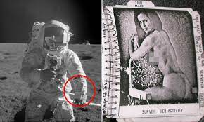 X-rated photos were secretly added to Apollo 12 astronauts' suits | Daily  Mail Online