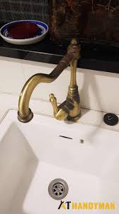 loose kitchen sink tap replacement