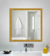 framed square wall mirror in yellow