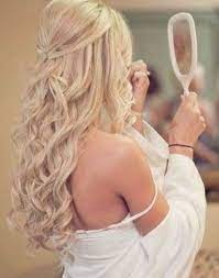 This simple prom hairstyle works well with hair that contains contrasting colors, such as very dark hair with bright blonde highlights. 52 Ideas For Wedding Hairstyles Half Up Half Down Blonde Long Curly Wedding Hairstyles Long Hair Styles Hair Styles Curls For Long Hair