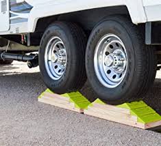 It is easier to back your rv into a couple of holes than it is to back it up onto a handy/novel idea for a 5er or trailer. Amazon Com Hopkins 08200 Endurance Rv Leveling System With Wheel Chock Automotive