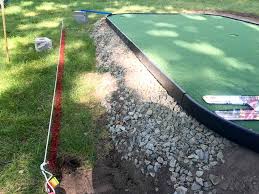 A diy putting green is the perfect project for a golf enthusiast who lives in areas where snow, ice, and cold weather hamper golfing activities. How To Diy A Putting Green In Your Backyard On The Cheap Dogwood Golf