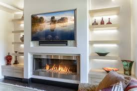 install a tv over a fireplace