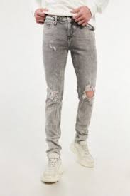 jeans rotos para hombre en varios fits