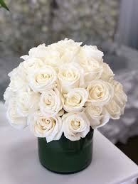 white roses by atlantas finest flowers