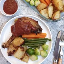 oven baked duck legs with potatoes and