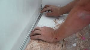 install lvp flooring against a bathtub