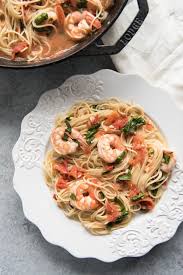 Place in a large pot of boiling water until skins begin to pull away, 2 to 3 stir in sauce and garnish with sea salt and basil. Angel Hair Pasta With Shrimp Tomatoes And Fresh Basil House Of Nash Eats