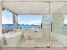 San Souci waterfront mansion has an ensuite bathroom with only internal  glass walls - realestate.com.au