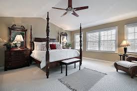 master bedroom with dark wood furniture