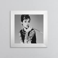 Audrey Hepburn With Framed Wall