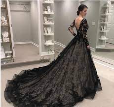 Long sleeved gowns are totally modern. Black Gothic Wedding Dresses Long Sleeve V Neck Backless Sweep Train Lace Illusion Bodice Garden Country Chapel Bridal Gowns Black Lace Wedding Dress Black Lace Wedding Black Wedding Dresses
