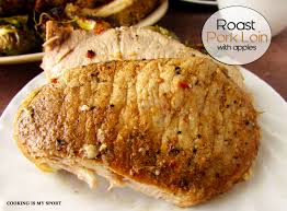 roast pork loin with apples cooking