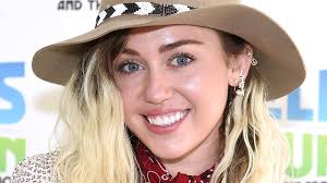miley cyrus says she changed her look