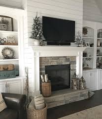 to decorate a mantel with a tv above it
