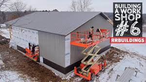 installing house wrap and metal siding