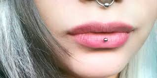 lip piercing scars causes and