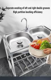 stainless kitchen sink with faucet