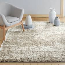taupe indoor area rug in the rugs