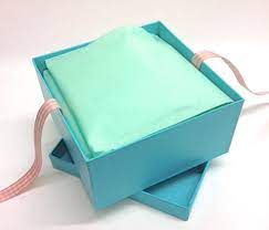 lining gift boxes with tissue