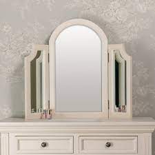 Not only jewelry, this full length mirror with storage can take care of your other beauty essentials. Triple Vanity Mirror Daventry Cream Range Melody Maison