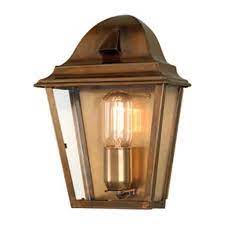 light flush fitting in solid antique brass