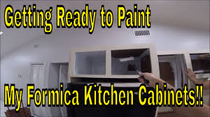 to paint my formica kitchen cabinets