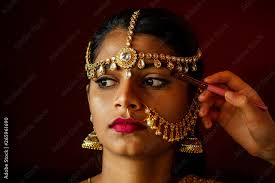 indian beautiful female in golden rich