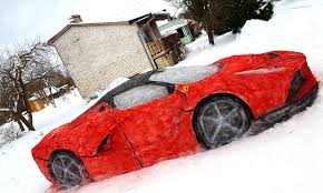 When special cars are built to stand the test of time, they have to have the it factor. N Ice Car Couple Carve Themselves A Life Size Ferrari Out Of Snow Daily Mail Online