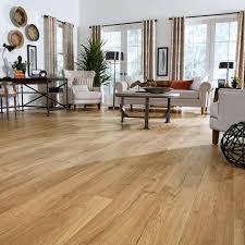 Is laminate flooring the same as wood flooring? Pergo Outlast 7 48 In W Marigold Oak Waterproof Laminate Wood Flooring 19 63 Sq Ft Case Lf000854 The Home Depot