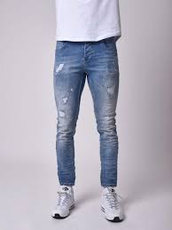 Skinny Fit Distressed Jeans With Splatter In Light Blue