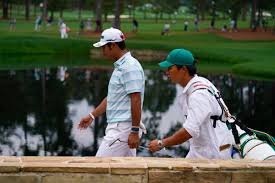 Japan's hideki matsuyama celebrates with his green jacket after winning the masters at augusta national golf club in augusta, georgia, april 11, 2021. Yew1cv2 5ypf0m