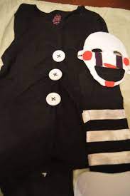 I found a sleeveless pleated black dress (really cute) added some german type binding. Diy Five Nights At Freddy S Puppet Marionette Costume Mayhem And Motherhood