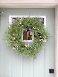 If you select one small enough and strategically arrange the branches or decor of your wreath. How To Hang A Wreath On A Glass Door Green With Decor