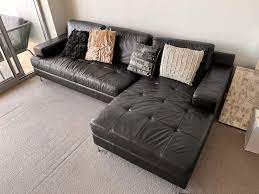 black leather lounge room couch sofas