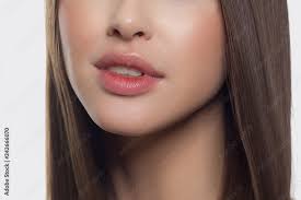 beauty closeup of women full red lips